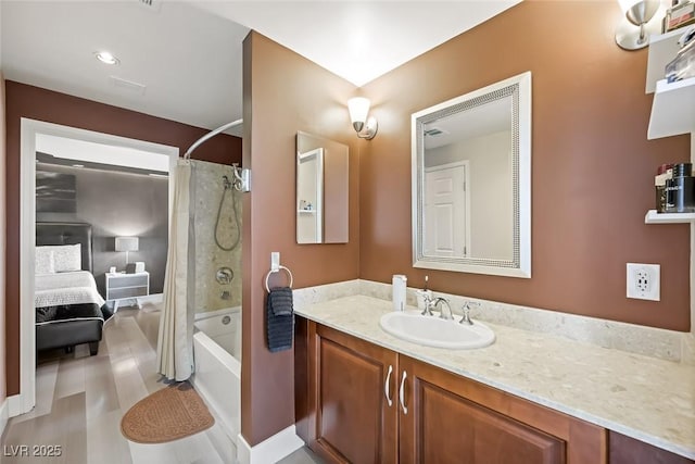 bathroom with vanity and shower / bath combo with shower curtain