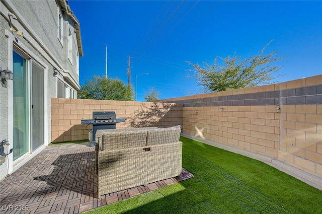 view of yard featuring a fenced backyard and a patio