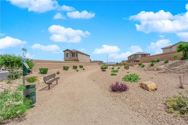 surrounding community featuring fence