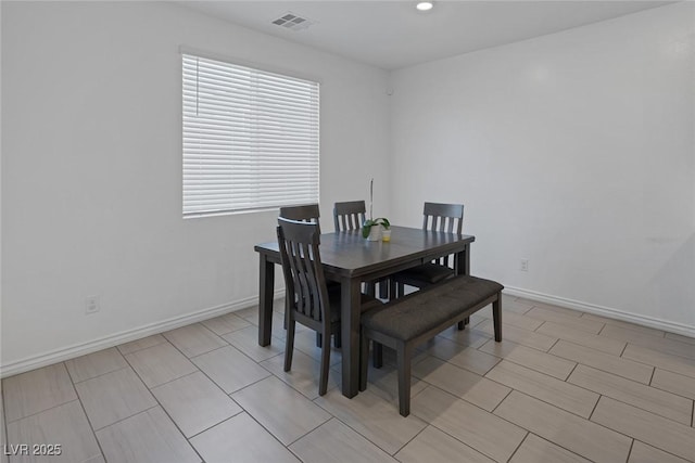 dining space featuring recessed lighting, baseboards, and visible vents