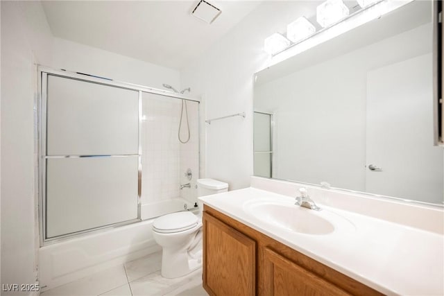 full bath with vanity, combined bath / shower with glass door, toilet, and visible vents