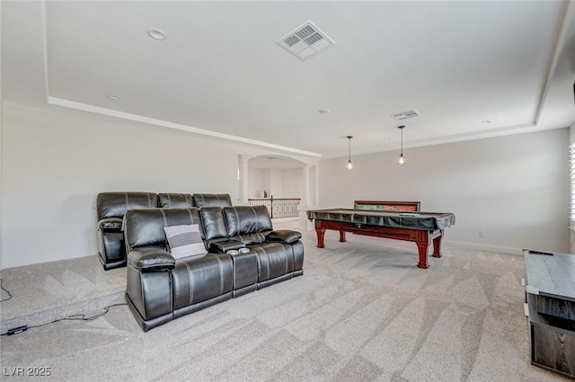 game room featuring arched walkways, carpet flooring, ornate columns, and visible vents