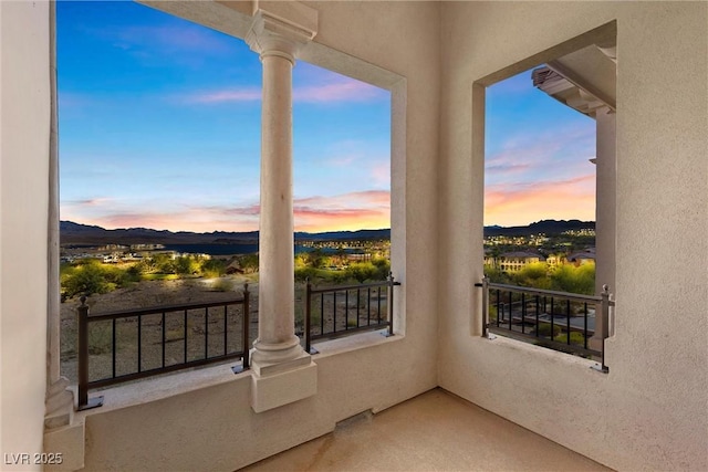 balcony featuring a mountain view
