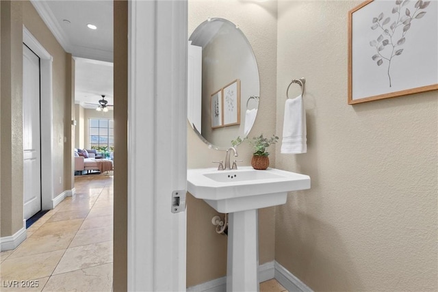bathroom featuring crown molding, ceiling fan, tile patterned flooring, recessed lighting, and baseboards