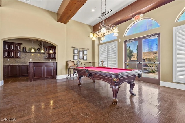 game room featuring baseboards, billiards, wood finished floors, a towering ceiling, and beamed ceiling