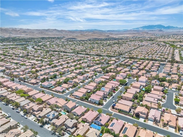 bird's eye view featuring a residential view and a mountain view