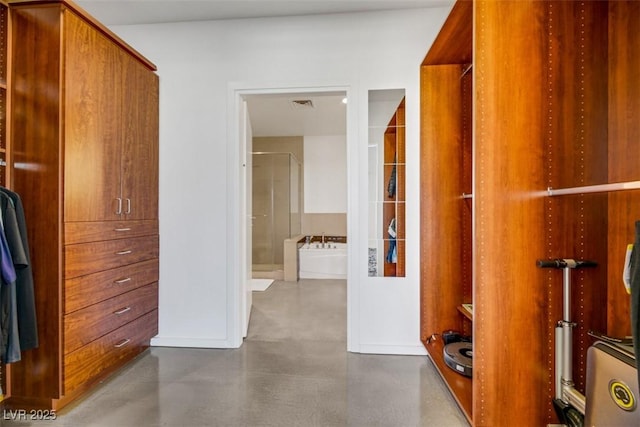 walk in closet with visible vents