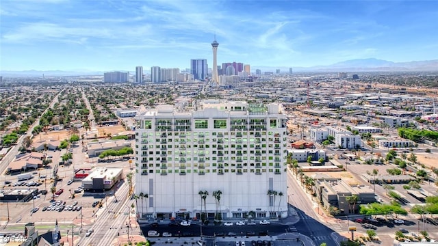 birds eye view of property featuring a view of city and a mountain view