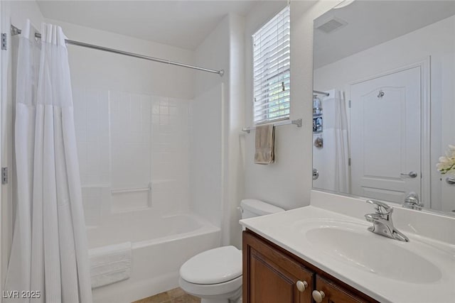bathroom with visible vents, toilet, shower / tub combo, and vanity