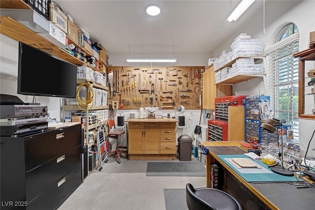 interior space featuring a workshop area