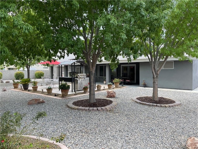 5200 Wheatland Dr, Pahrump, NV 89061 - view of front of property with a patio area and stucco siding