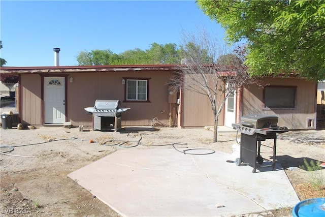 back of house featuring a patio