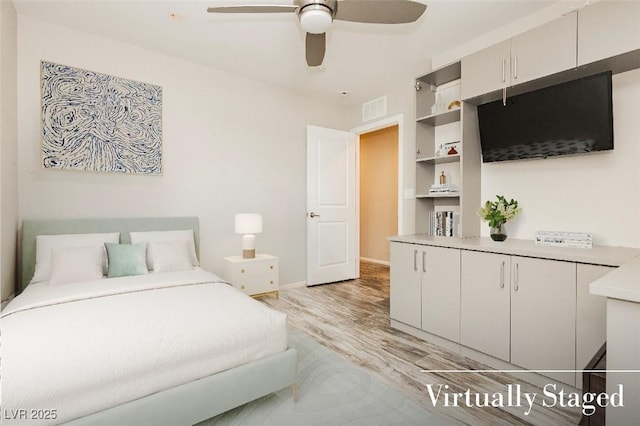3163 Biccari Ave, Henderson, NV 89044 - bedroom with light wood finished floors, baseboards, and ceiling fan