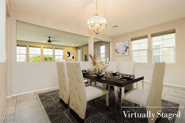 3163 Biccari Ave, Henderson, NV 89044 - dining room with a chandelier, baseboards, light tile patterned floors, and a ceiling fan