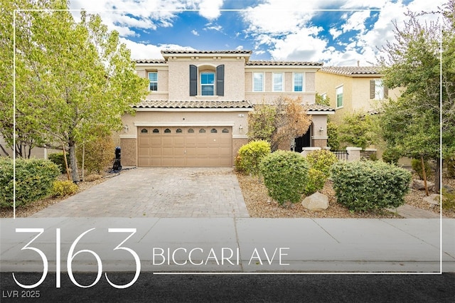 3163 Biccari Ave, Henderson, NV 89044 - mediterranean / spanish-style home with a garage, driveway, stucco siding, and a tile roof