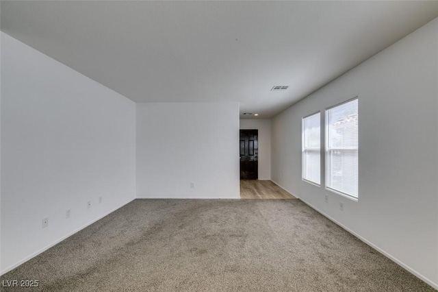 8877 Perfect Diamond Ct, Las Vegas, NV 89129 - empty room with baseboards, visible vents, and carpet
