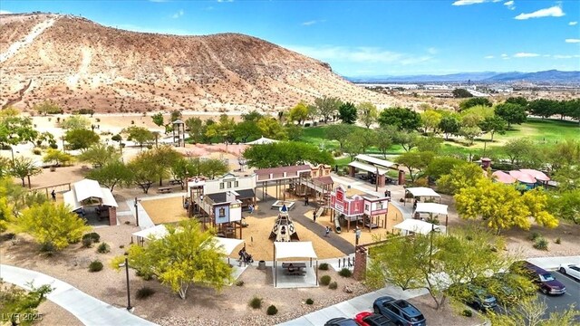 drone / aerial view featuring a mountain view