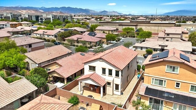 bird's eye view featuring a residential view and a mountain view