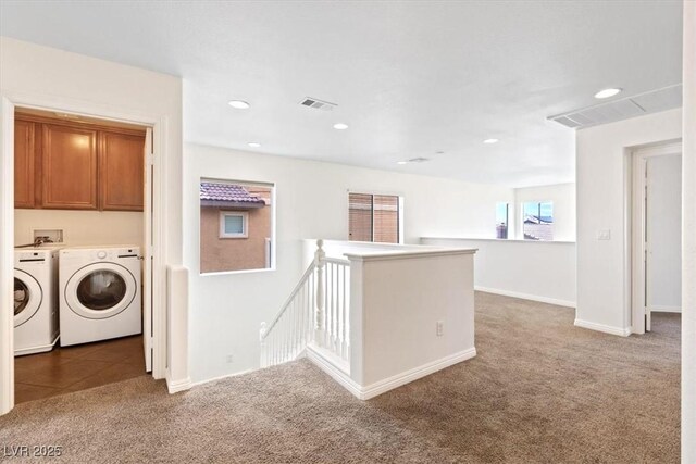 clothes washing area with visible vents, cabinet space, carpet floors, recessed lighting, and washer and clothes dryer