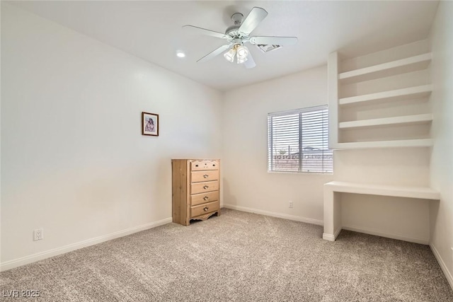 unfurnished bedroom with baseboards, ceiling fan, and carpet flooring
