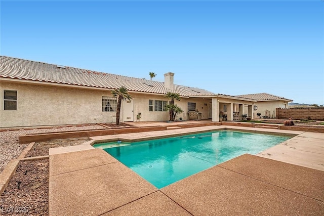 view of pool featuring a fenced in pool, fence, and a patio
