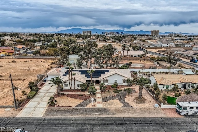 birds eye view of property featuring a residential view and a mountain view