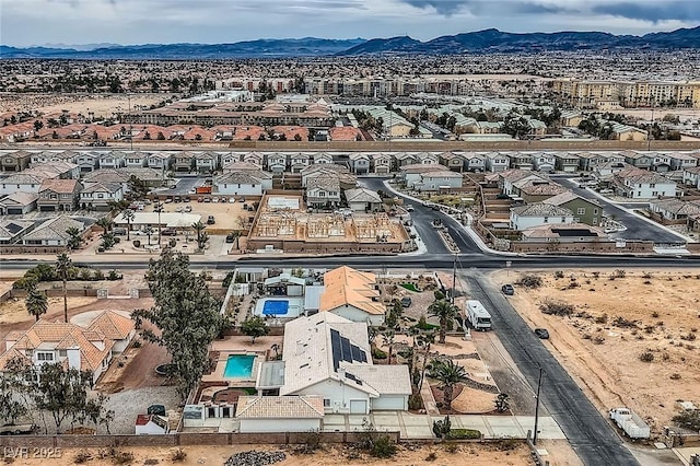 drone / aerial view with a mountain view and a residential view