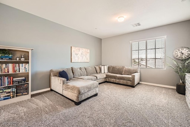 living area featuring carpet floors, baseboards, and visible vents