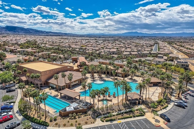 birds eye view of property featuring a mountain view