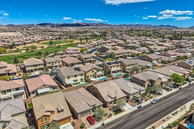 birds eye view of property with a residential view and a mountain view