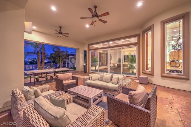 exterior space featuring ceiling fan and an outdoor hangout area