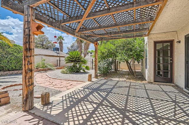 view of patio with a fenced backyard and a pergola