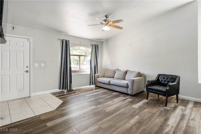 8504 W Gilmore Ave, Las Vegas, NV 89129 - living room with a ceiling fan, wood finished floors, and baseboards