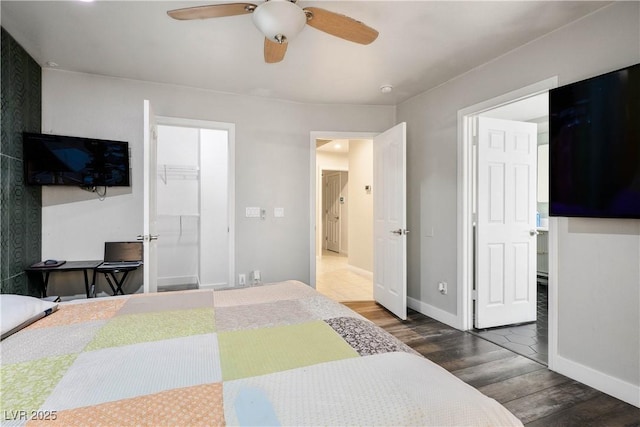 8504 W Gilmore Ave, Las Vegas, NV 89129 - bedroom with wood finished floors, baseboards, and ceiling fan