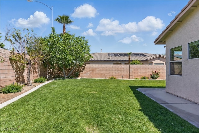 view of yard with a fenced backyard