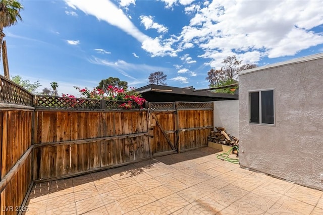 516 Delfern Ln, Las Vegas, NV 89169 - view of patio / terrace with a gate
