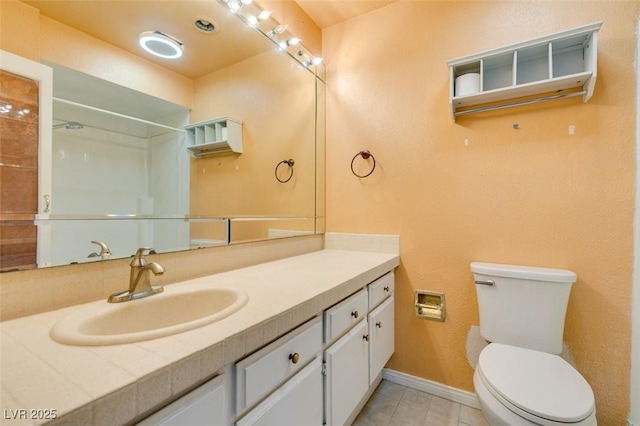 516 Delfern Ln, Las Vegas, NV 89169 - full bathroom with toilet, vanity, baseboards, tile patterned flooring, and a shower