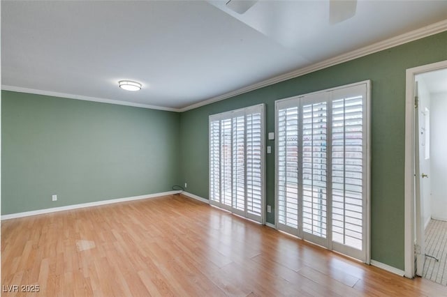 516 Delfern Ln, Las Vegas, NV 89169 - unfurnished room featuring ceiling fan, wood finished floors, baseboards, and crown molding