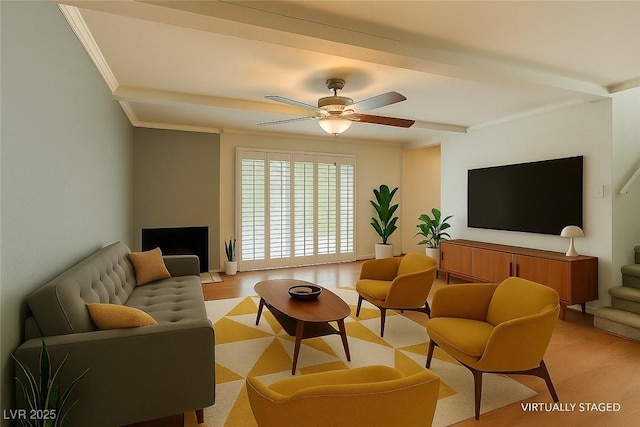 516 Delfern Ln, Las Vegas, NV 89169 - living room with light wood-type flooring, crown molding, and a ceiling fan