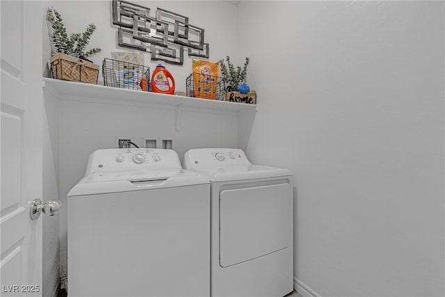 clothes washing area with laundry area and washing machine and dryer