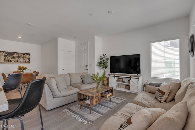 living room featuring recessed lighting and wood finished floors