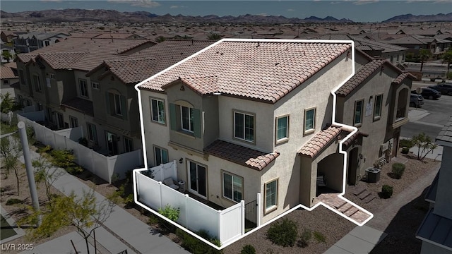 bird's eye view with a residential view and a mountain view