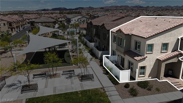 birds eye view of property featuring a residential view and a mountain view
