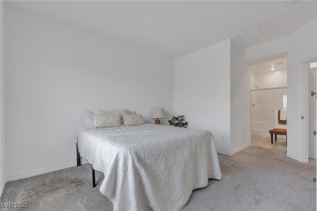 carpeted bedroom with baseboards and visible vents
