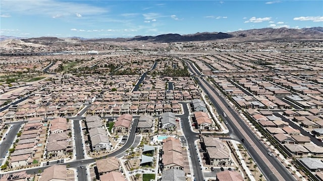 drone / aerial view with a residential view and a mountain view