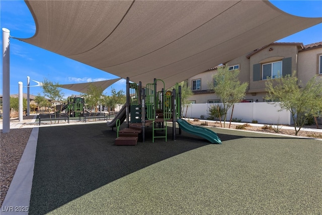 community playground featuring fence