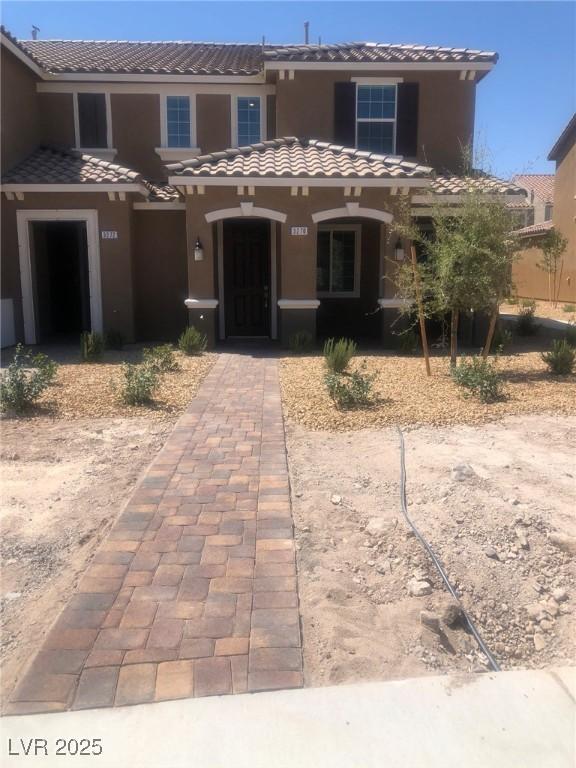 3270 Trabia Ave, Henderson, NV 89044 - view of front facade featuring a tiled roof and stucco siding