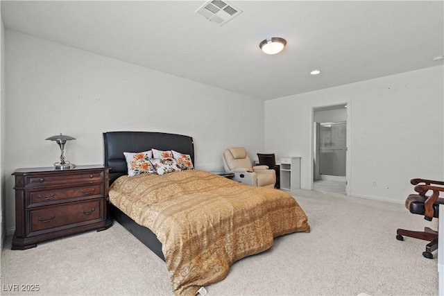 carpeted bedroom featuring connected bathroom, baseboards, and visible vents
