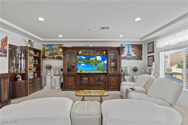 carpeted living room featuring recessed lighting and visible vents