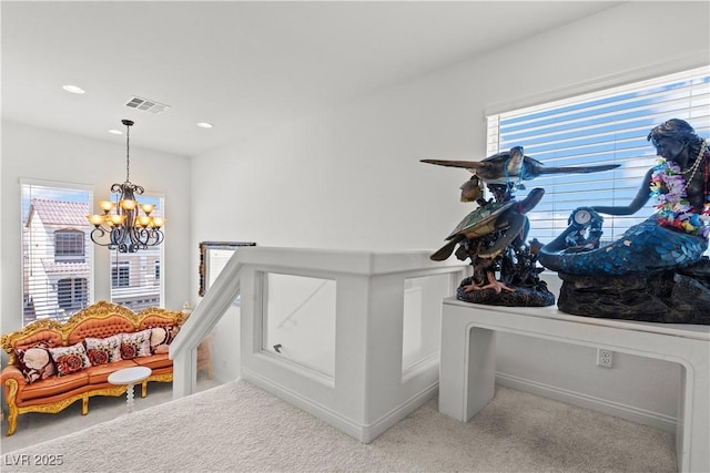 room details with carpet floors, recessed lighting, a notable chandelier, and visible vents
